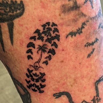 Heatstroke Tattoo - Hiking Boot Tread w/ Palm Tree & Skull Rock by Jimmi for $200. - Piercing Near Me - Indio, California Heatstroke Tattoo - Hiking Boot Tread w/ Palm Tree & Skull Rock by Jimmi for $200. - Piercing Near Me - Indio, California