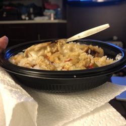 Wow Bao - Orange chicken bowl with pot sticker.