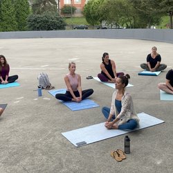 Sawyer Point Riverfront Rink - Yoga for Skaters, free program offered by Skate Downtown Cincy with partners Cincy Parks Foundation, Cincy Parks, & Soaring Soul Wellness.