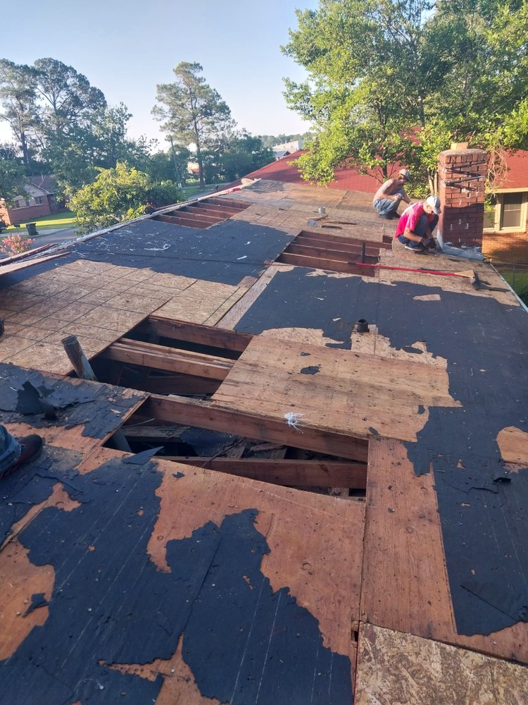 Slide of Tyndal Roofing