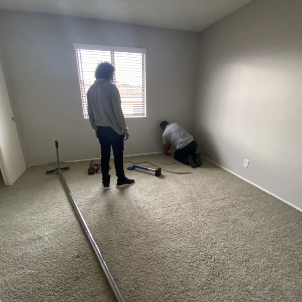 The Floors Network - Working on one of the bedrooms, stretching the older carpet - Flooring Near Me - San Pedro, California The Floors Network - Working on one of the bedrooms, stretching the older carpet - Flooring Near Me - San Pedro, California