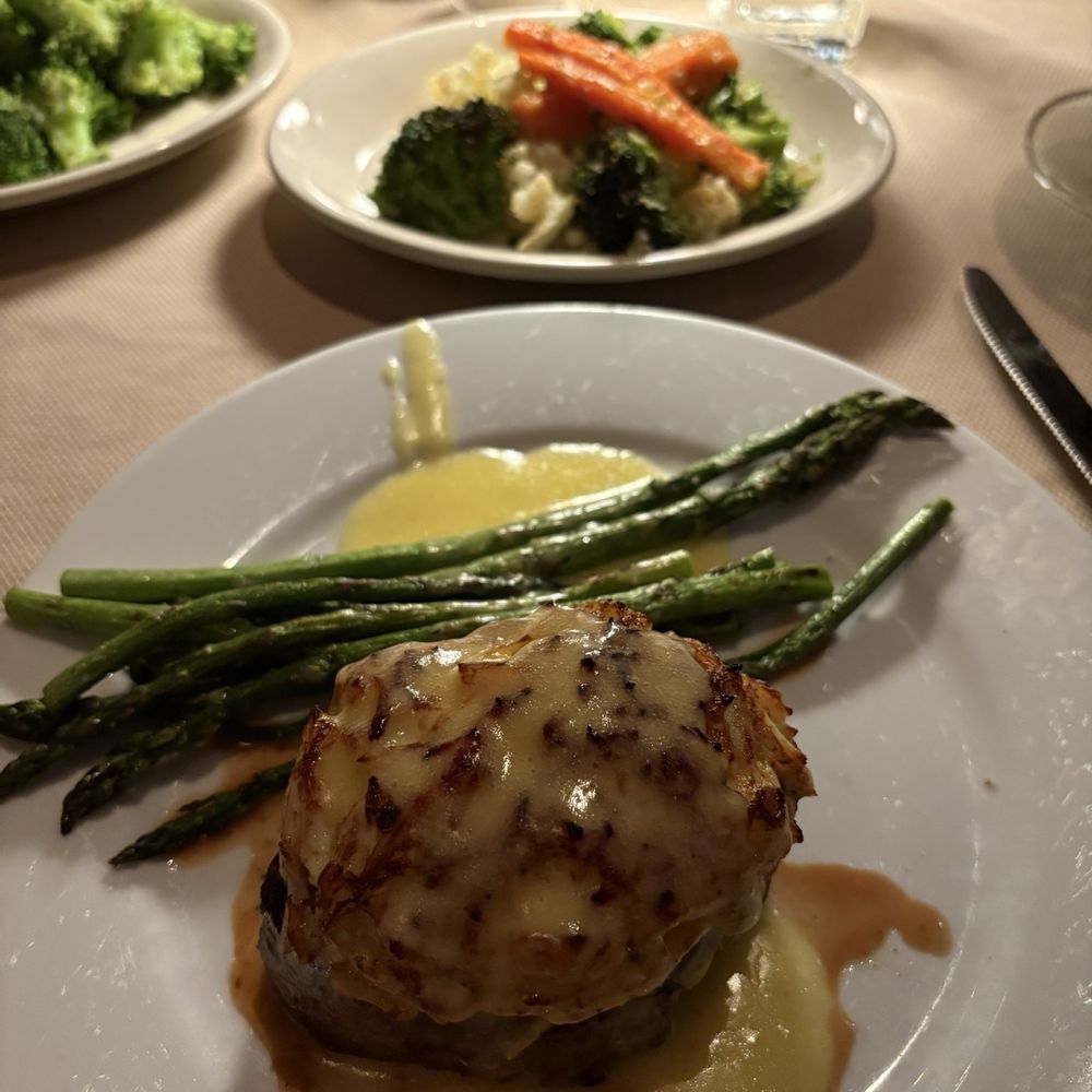 Dutch's Daughter - My Filet Mignon topped with Crab Imperial, fresh vegetables of the day and asparagus with hollandaise sauce. - Seafood Near Me - Frederick, Maryland Dutch's Daughter - My Filet Mignon topped with Crab Imperial, fresh vegetables of the day and asparagus with hollandaise sauce. - Seafood Near Me - Frederick, Maryland