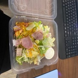 this is a terrible display of a chef salad including the contents. & the salad actually looks larger in the picture. this is a terrible display of a chef salad including the contents. & the salad actually looks larger in the picture.