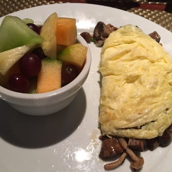 Eli's Table - Wild mushroom omelette with a side of fruit. Five stars! - Southern Near Me - Charleston, South Carolina Eli's Table - Wild mushroom omelette with a side of fruit. Five stars! - Southern Near Me - Charleston, South Carolina