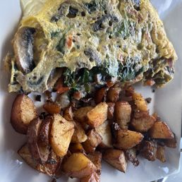 Veggie omelette with added mushrooms and cheese Veggie omelette with added mushrooms and cheese