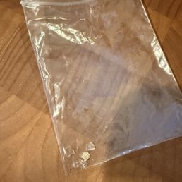 Plastic collected from multiple pieces of pizza as people were eating. Plastic collected from multiple pieces of pizza as people were eating.