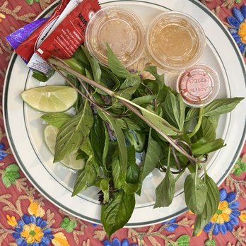 Pho Ga Hai Van - Plenty of basil leaves and ngo gai (thorny herb) and a big bag of bean sprouts (not pictured) - Vietnamese Near Me - Westminster, California