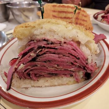 Zan's Kosher Deli - Pastrami and corned beef with sauerkraut between a knish - Kosher Near Me - Lake Grove, New York