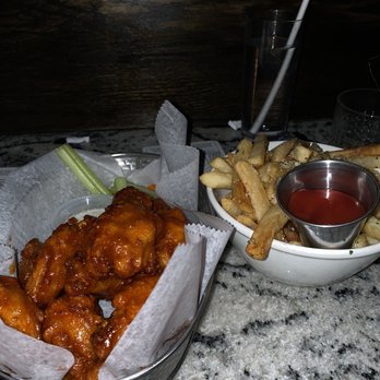 Locksmith Bar - Honey sriracha wings & truffle fries! - New American Near Me - New York, New York Locksmith Bar - Honey sriracha wings & truffle fries! - New American Near Me - New York, New York