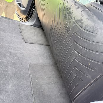 Finn's Auto Detailing - Grass left under the mat and floorboard after "detailing" - Auto Detailing Near Me Finn's Auto Detailing - Grass left under the mat and floorboard after "detailing" - Auto Detailing Near Me