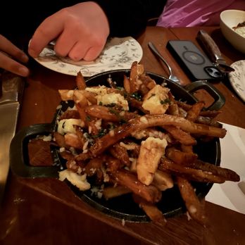 Le Cellier Steakhouse - Signature Poutine - Steakhouses Near Me - Orlando, Florida Le Cellier Steakhouse - Signature Poutine - Steakhouses Near Me - Orlando, Florida