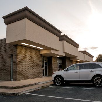 The Wine Authority - a car parked in front of a building - Wine Tasting Room Near Me - Richardson, Texas