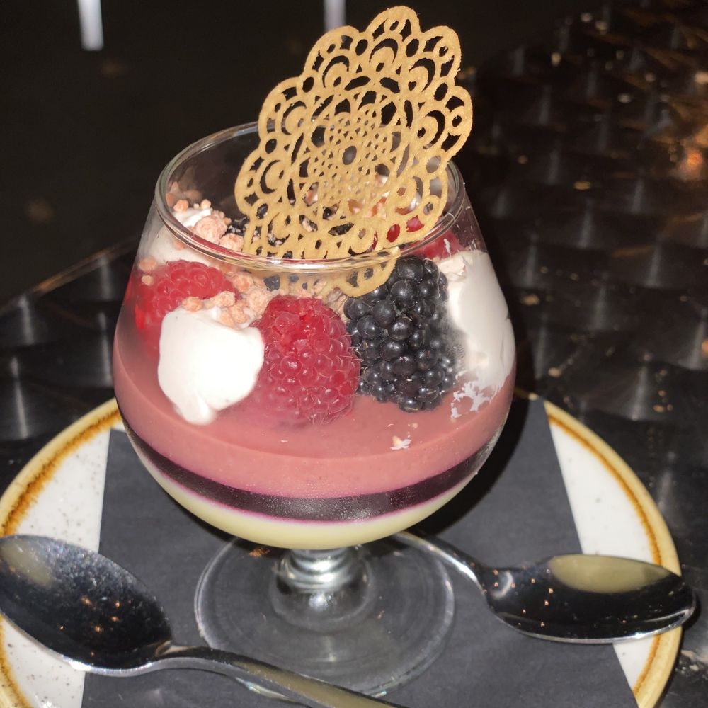 Cadre Restaurant - This is the Summer Verrine with blueberry & shiso gelée , whipped kirsch and white chocolate mousse, Marcona almonds, tuille and violas. YUM - French Near Me - Madison, Wisconsin Cadre Restaurant - This is the Summer Verrine with blueberry & shiso gelée , whipped kirsch and white chocolate mousse, Marcona almonds, tuille and violas. YUM - French Near Me - Madison, Wisconsin
