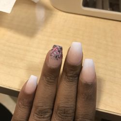 Super Nail - Narrow Coffins nails. That's what I call it. This is before she polished them. The colors are ombré. The glitter color is 14 or 41