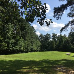 Glen Allen Community Montessori - Big, beautiful outdoor space for play and exploration in nature. Includes 2 playgrounds, a children's garden and meditation circle