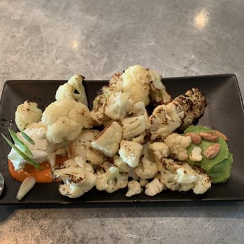 etch - To asted Cauliflower. See the feta crema on the side with the green onion slivers? That's what you want to eat. - New American Near Me - Nashville, Tennessee etch - To asted Cauliflower. See the feta crema on the side with the green onion slivers? That's what you want to eat. - New American Near Me - Nashville, Tennessee