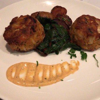 Old Ebbitt Grill - Jumbo Lump Crab Cakes, roasted potatoes, Swiss chard, and Cajun remoulade. - Bars Near Me - Washington, DC, District of Columbia Old Ebbitt Grill - Jumbo Lump Crab Cakes, roasted potatoes, Swiss chard, and Cajun remoulade. - Bars Near Me - Washington, DC, District of Columbia
