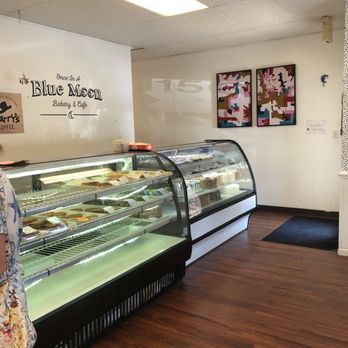 Once In A Blue Moon Bakery & Cafe - The serving area where specialty cakes are offered. - Bakeries Near Me - Cary, North Carolina