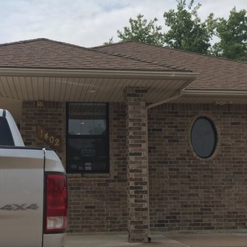 Lail Chiropractic Center - Front of building - blends in with the houses except it has a parking lot. - Chiropractors Near Me - Lawton, Oklahoma Lail Chiropractic Center - Front of building - blends in with the houses except it has a parking lot. - Chiropractors Near Me - Lawton, Oklahoma