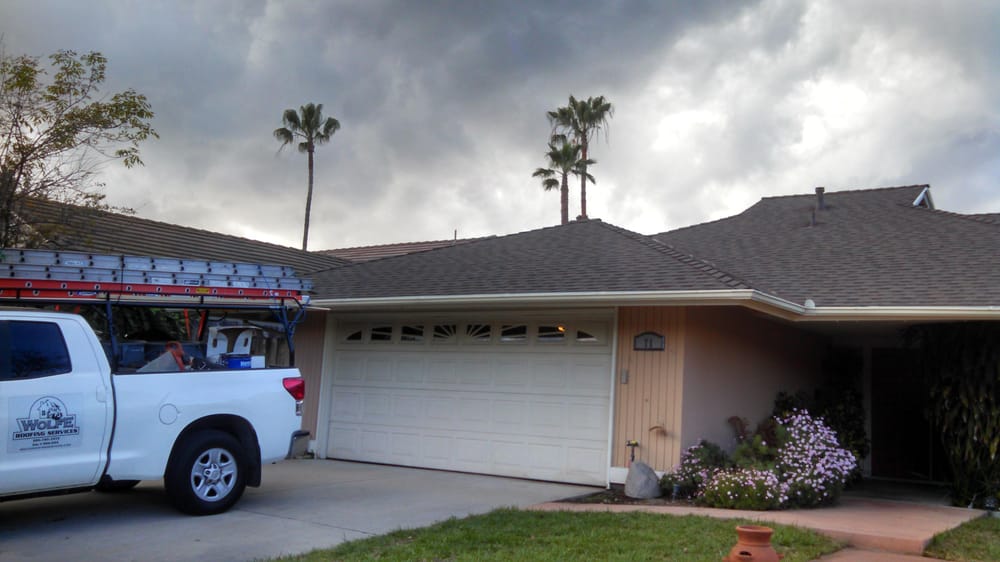 Slide of Wolfe Roofing Company