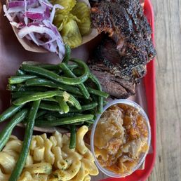 Brisket, pork, ribs, green beans, mac & cheese, peach cobbler Brisket, pork, ribs, green beans, mac & cheese, peach cobbler