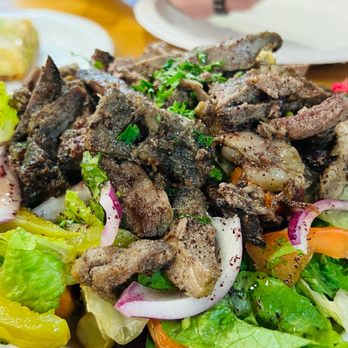 Habibi Lebanese Grill - a plate of meat and vegetables - Mediterranean Near Me - Orlando, Florida