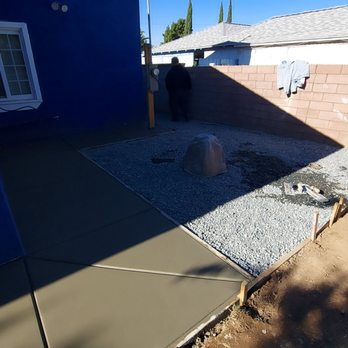 Green Landscape - a blue house with a white window - Landscaping Near Me - Corona, California Green Landscape - a blue house with a white window - Landscaping Near Me - Corona, California