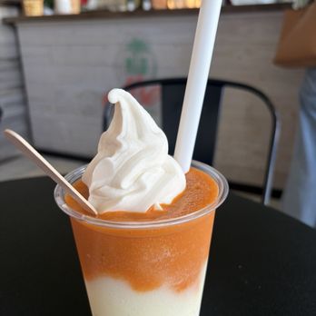 Niu Soft Serve - Slushie- mix with Kalamansi slushie and Thai tea slushie with niu (coconut) soft serve. Total: ~$8 - Desserts Near Me - Honolulu, Hawaii Niu Soft Serve - Slushie- mix with Kalamansi slushie and Thai tea slushie with niu (coconut) soft serve. Total: ~$8 - Desserts Near Me - Honolulu, Hawaii