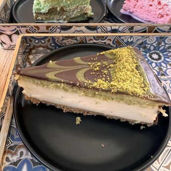 Qamaria Coffee - Pistachio knafeh cheesecake - Coffee & Tea Near Me - Fullerton, California Qamaria Coffee - Pistachio knafeh cheesecake - Coffee & Tea Near Me - Fullerton, California