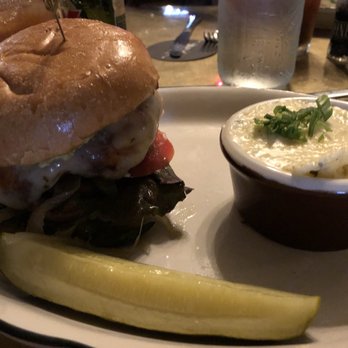 Moonshine Grill - Backyard Chicken sandwich and grits - Southern Near Me - Austin, Texas