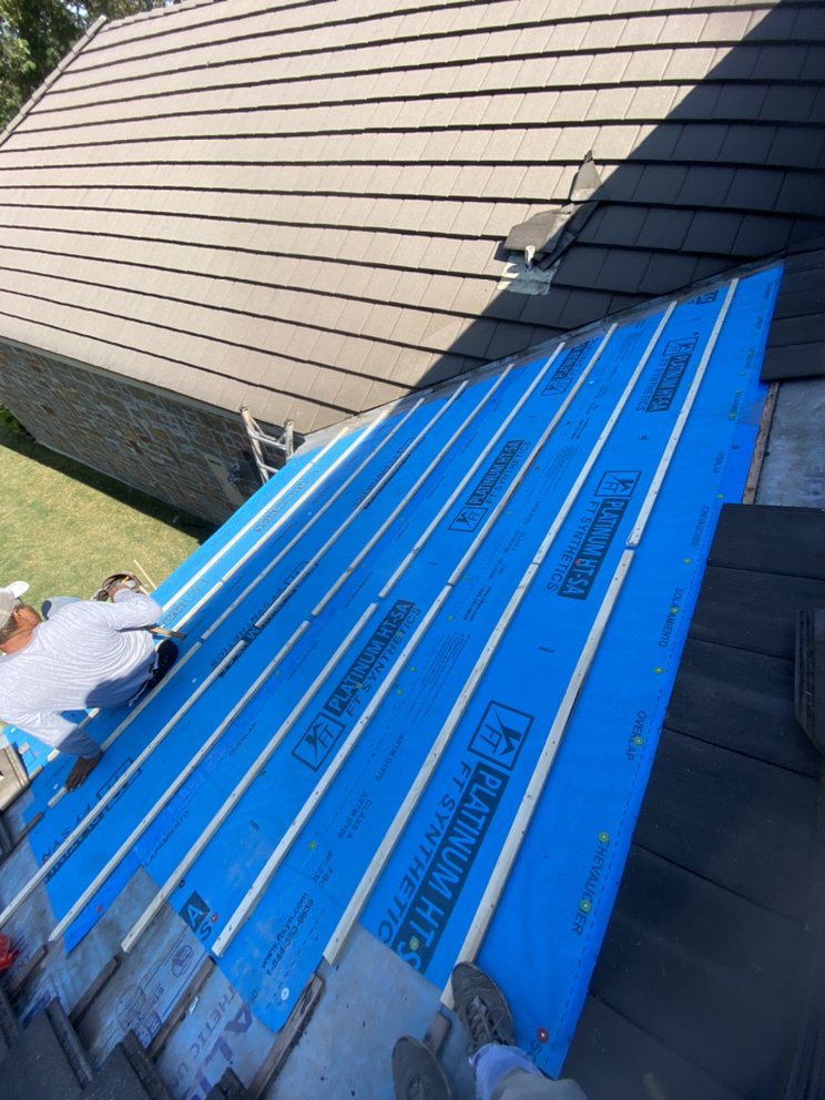 Slide of Holguin Roofing & Exteriors