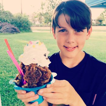Lottie's Shivers Shaved Ice - Root beer shaved snow cone topped with whipped cream and sprinkles! Jake Ryan's Favorite - Shaved Ice Near Me - Conroe, Texas