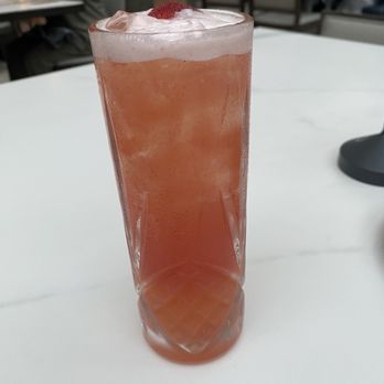 Zeppole - Tropical Spark mocktail with vodka - Italian Near Me - Grapevine, Texas Zeppole - Tropical Spark mocktail with vodka - Italian Near Me - Grapevine, Texas