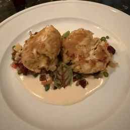 These are the crabcakes and there's a little bacon sauce and yes, everything is better with bacon. Oh and definitely get the bread pudding.