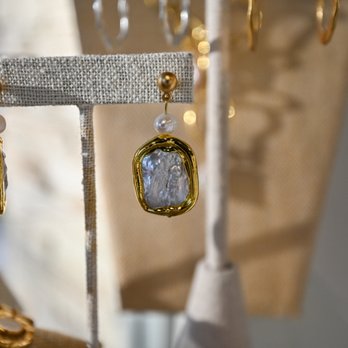 Salon Le Volume - A close-up look at the beautiful jewelry curated in our salon boutique--thoughtful pieces to complement any look. - Hair Salons Near Me - Frisco, Texas Salon Le Volume - A close-up look at the beautiful jewelry curated in our salon boutique--thoughtful pieces to complement any look. - Hair Salons Near Me - Frisco, Texas