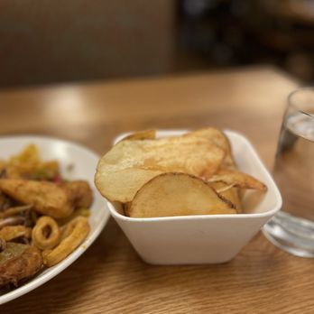 Elway's - a plate of food and a glass of water - New American Near Me - Denver, Colorado