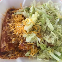 3 tamales in to-go container. 3 tamales in to-go container.