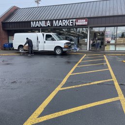 a van parked in front of the store