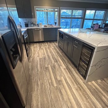 SunFire Construction - FYI, we didn't have electrical in our old island. Also, this one is much larger and he increased our working space. - Solar Installation Near Me