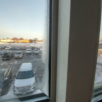 Hilton Garden Inn Oshkosh - That is ice on the inside of my window - not condensation. - Hotels Near Me - Oshkosh, Wisconsin Hilton Garden Inn Oshkosh - That is ice on the inside of my window - not condensation. - Hotels Near Me - Oshkosh, Wisconsin