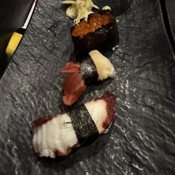 Arata Sushi - Top to Bottom: Ikura, Red Clam, Octopus - Japanese Near Me - Syosset, New York Arata Sushi - Top to Bottom: Ikura, Red Clam, Octopus - Japanese Near Me - Syosset, New York
