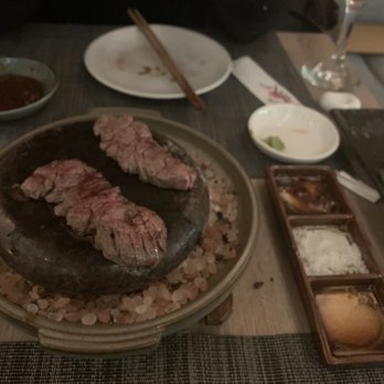 Sushi Hachi - Searing beef on hot stone... love the sauces and truffle salt it comes with - Sushi Bars Near Me - Washington, DC, District of Columbia