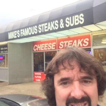 Mike's Famous Steaks & Subs - sign selfie - philadelphia cheesesteak adventure - Sandwiches Near Me - Newark, Delaware