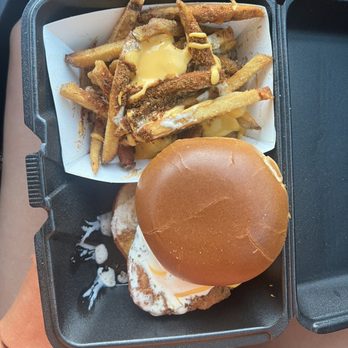 Wingstop - a tray of fries and a cheeseburger - Chicken Wings Near Me - Princeton, Texas