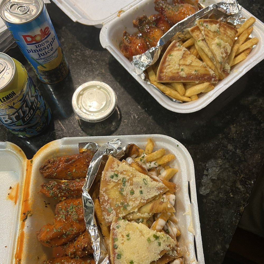 Keiths Special Combo - Hot wings with lemon pepper seasoning, cajun ranch fries, and bread. Keiths Special Combo - Hot wings with lemon pepper seasoning, cajun ranch fries, and bread.