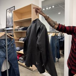 Seven For All Mankind Outlet - Salesman Rob showing me his leather jacket