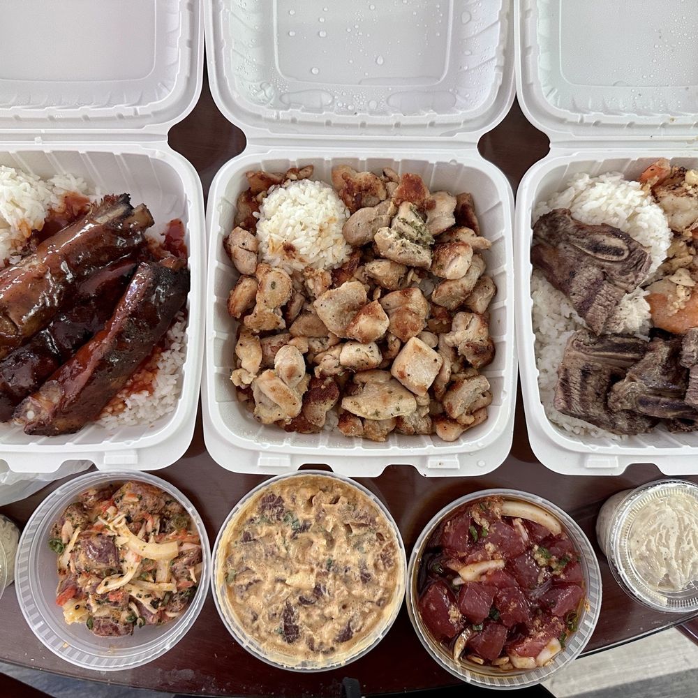 Kau Kau Grill - BBQ Baby Back Ribs (left), Garlic Chicken (middle), and Pulehu Beef Short Ribs & Garlic Shrimp (right). Poke below - Barbeque Near Me - Honolulu, Hawaii