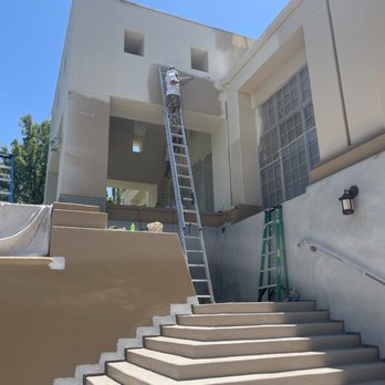 DLM Painting - Spraying body of house - Painters Near Me