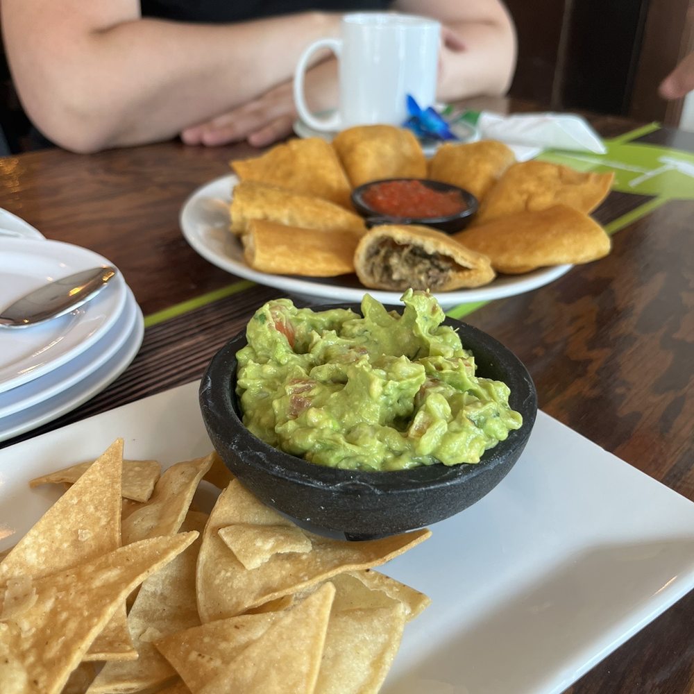 Empanada sampler and fresh guacamole and chips Empanada sampler and fresh guacamole and chips