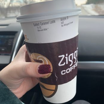 Ziggi's Coffee - a hand holding a cup of coffee - Coffee & Tea Near Me - Ankeny, Iowa